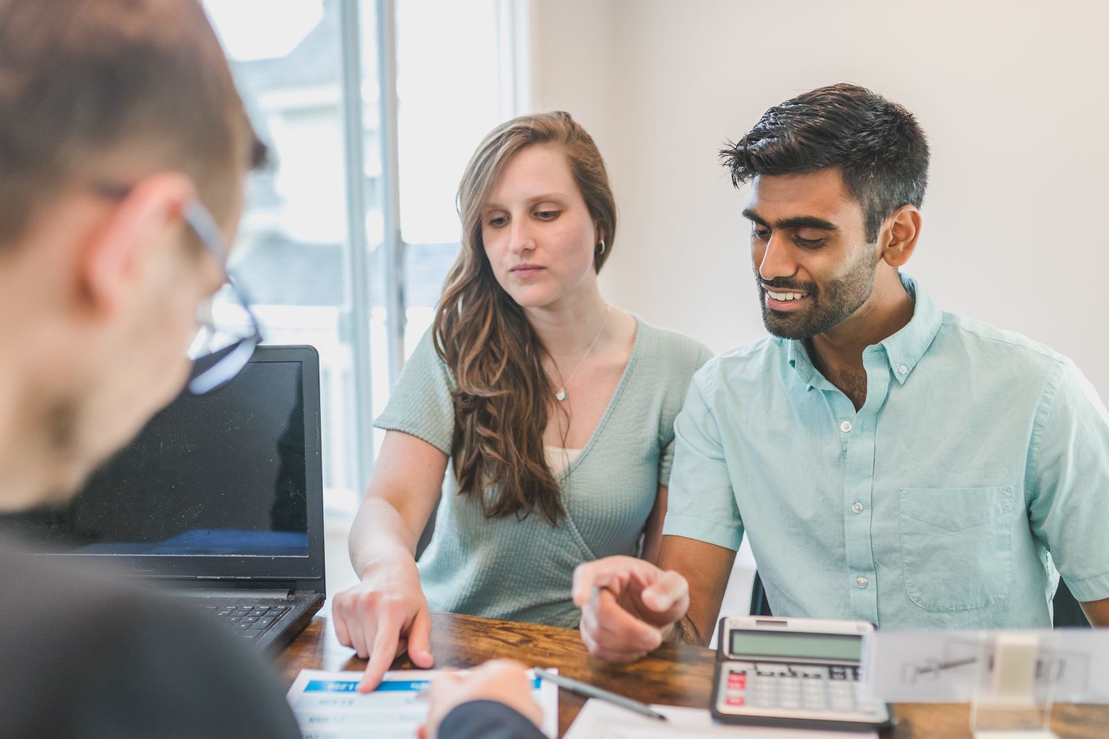 Stock photograph of an adviser meeting a client