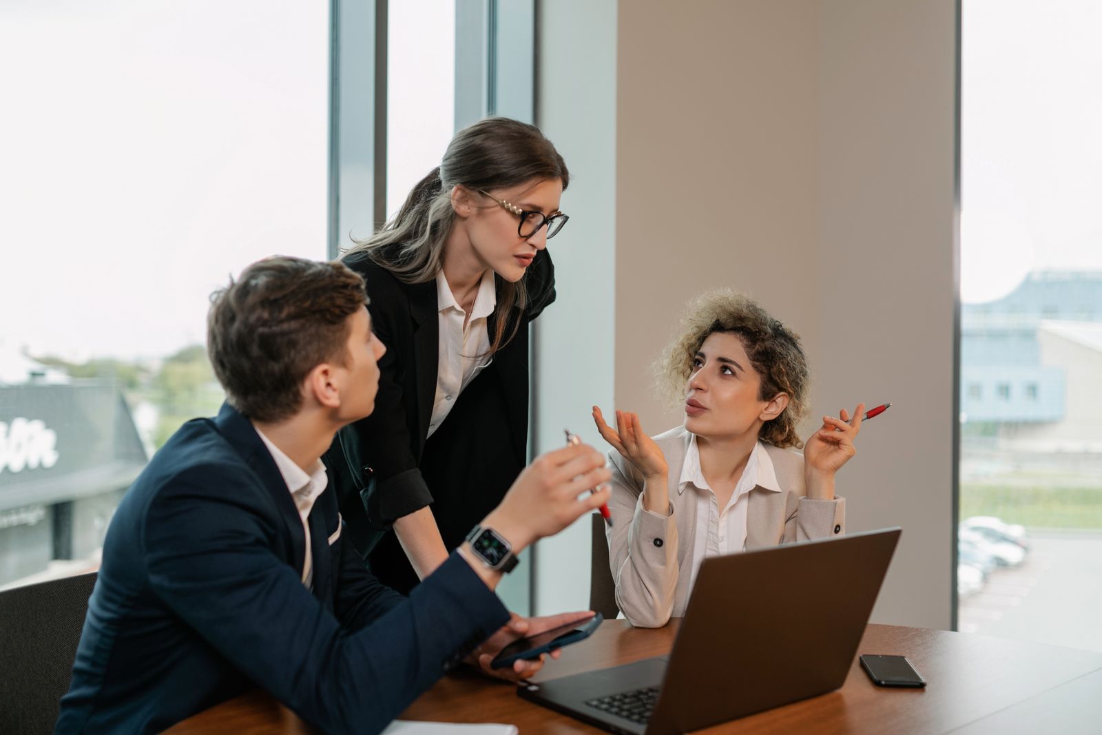 Stock photograph of business founders planning together